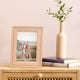 Wooden photo frame on table top